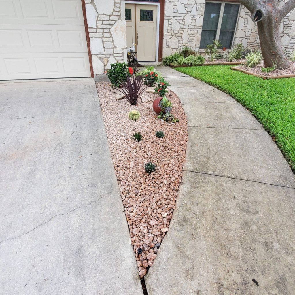 Image of front yard zeroscape installed and maintained by barron landscaping near me in san antonio
