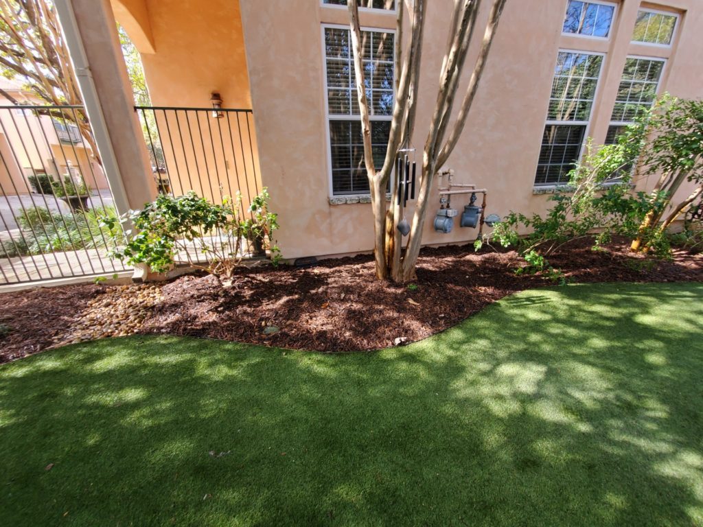Image of mulch flower beds and lawn installed and ...